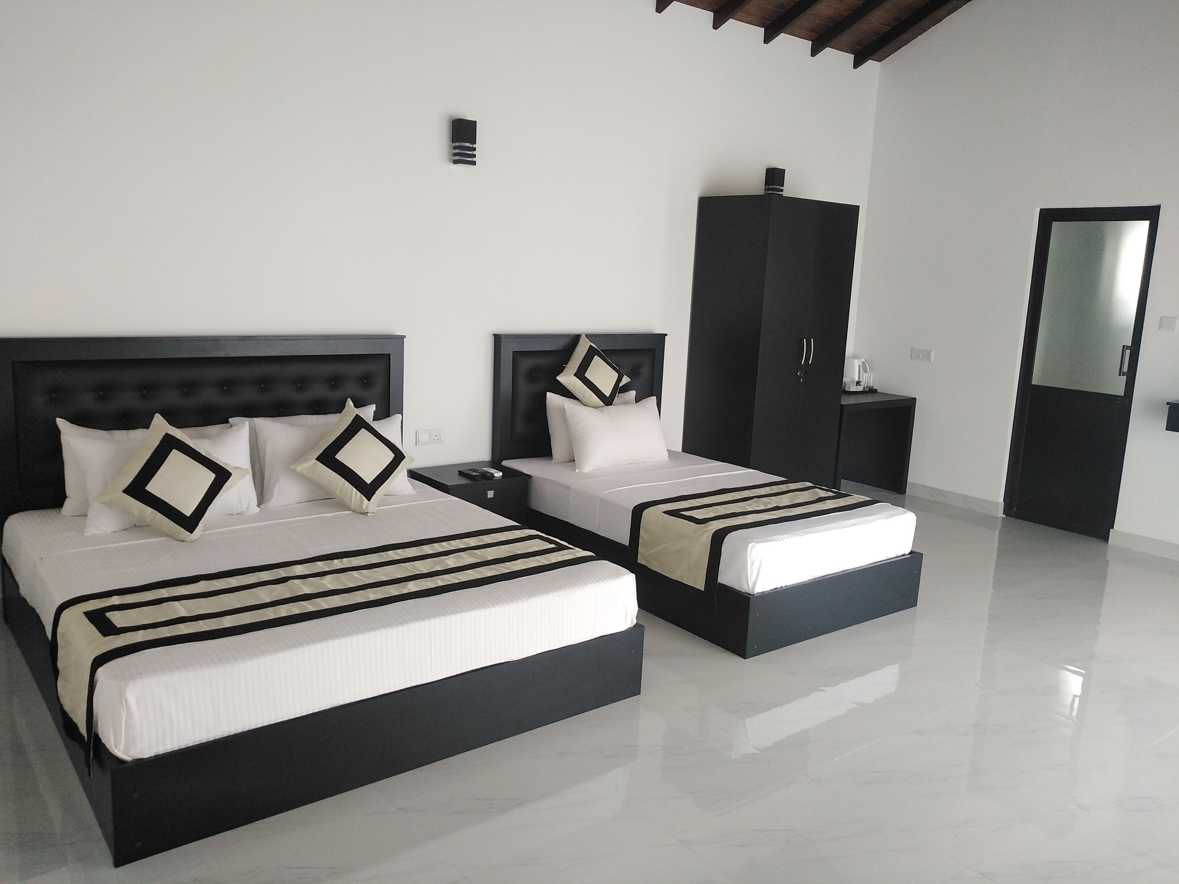 Deluxe studio suite, meerdere bedden, niet-roken, uitzicht op tuin | Luxe beddengoed, een kluis op de kamer, individueel gedecoreerd