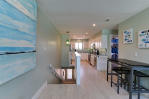 Full-size fridge, microwave, dishwasher, cookware/dishes/utensils