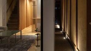 A modern interior with a staircase, a seating area, and a hallway. - Residence Jo 15 Karasuma shijyo (Kyoto)