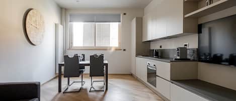 Apartment, 1 Bedroom | Private kitchen | Fridge, stovetop, electric kettle, toaster
