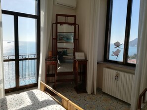 Habitación doble, vistas al mar (Brezza di Mare) | Cortinas opacas, cunas (de pago), camas supletorias y wifi gratis