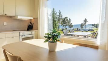 Hytte â deluxe | Utsikt mot strand/hav