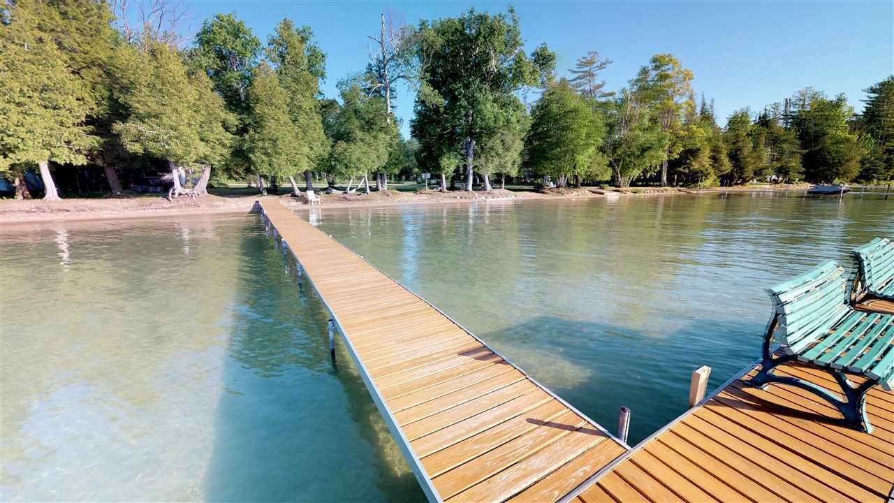 On Walloon Lake! Beautifully remodeled large condo with beach area.