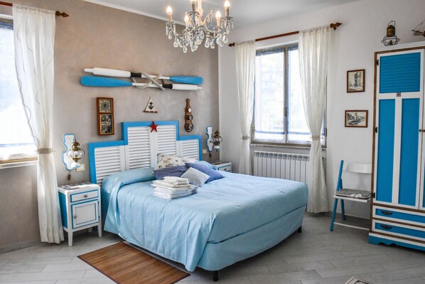 Triple Room (Stanza del Porto) | Down comforters, in-room safe, individually decorated