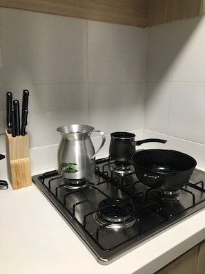 Microwave, coffee/tea maker, cookware/dishes/utensils
