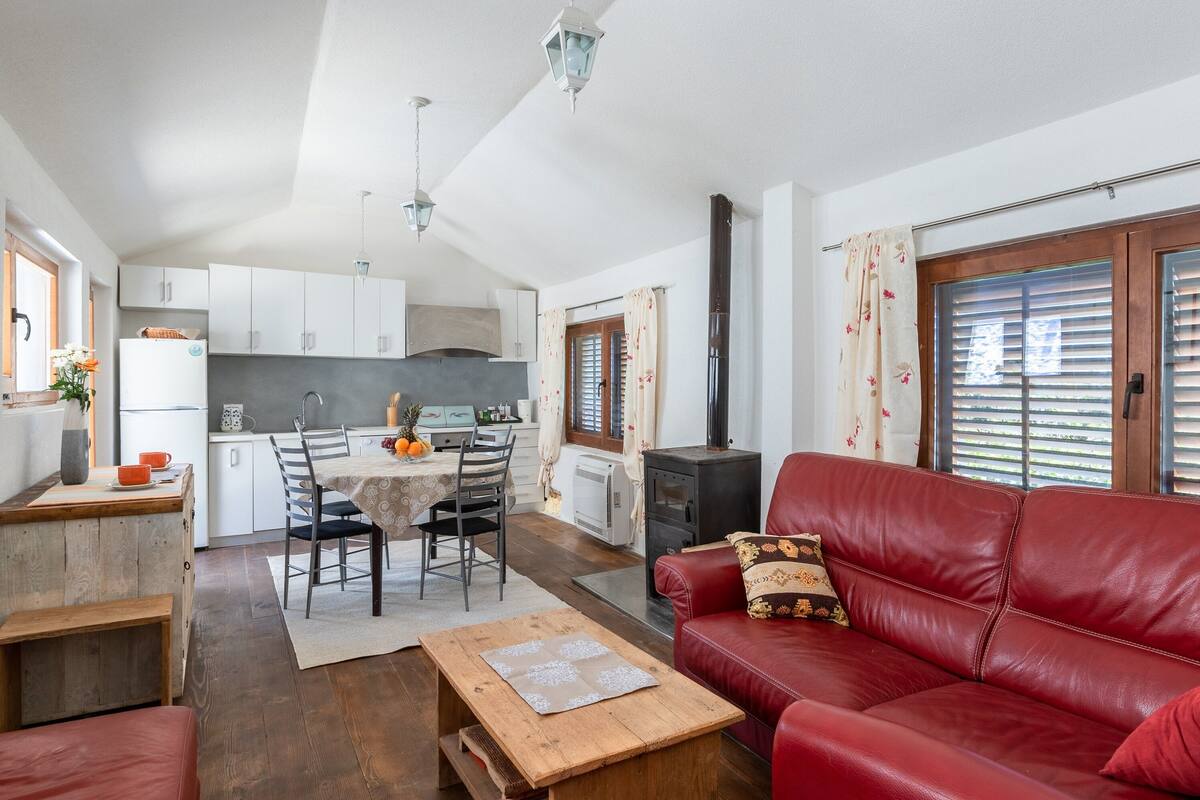 Standard Villa, Garden View | Living area | Flat-screen TV