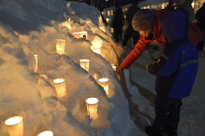 A snowman with lit candles inside. - The Base Sapporo Susukino (Sapporo)