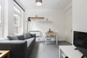 Apartment, 1 Double Bed with Sofa bed, Accessible | Living area | Flat-screen TV - Cozy Apartment in Camden Town (London)