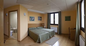 Desk, laptop workspace, free cots/infant beds, rollaway beds