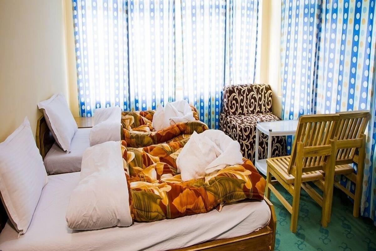 Deluxe kamer, 1 twee- of 2 eenpersoonsbedden, 1 kingsize bed, uitzicht op bergen | 20 slaapkamers, lakens van Egyptisch katoen, luxe beddengoed