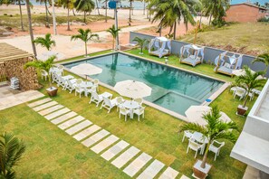 Indoor pool, open 6:00 AM to 10:00 PM, pool loungers