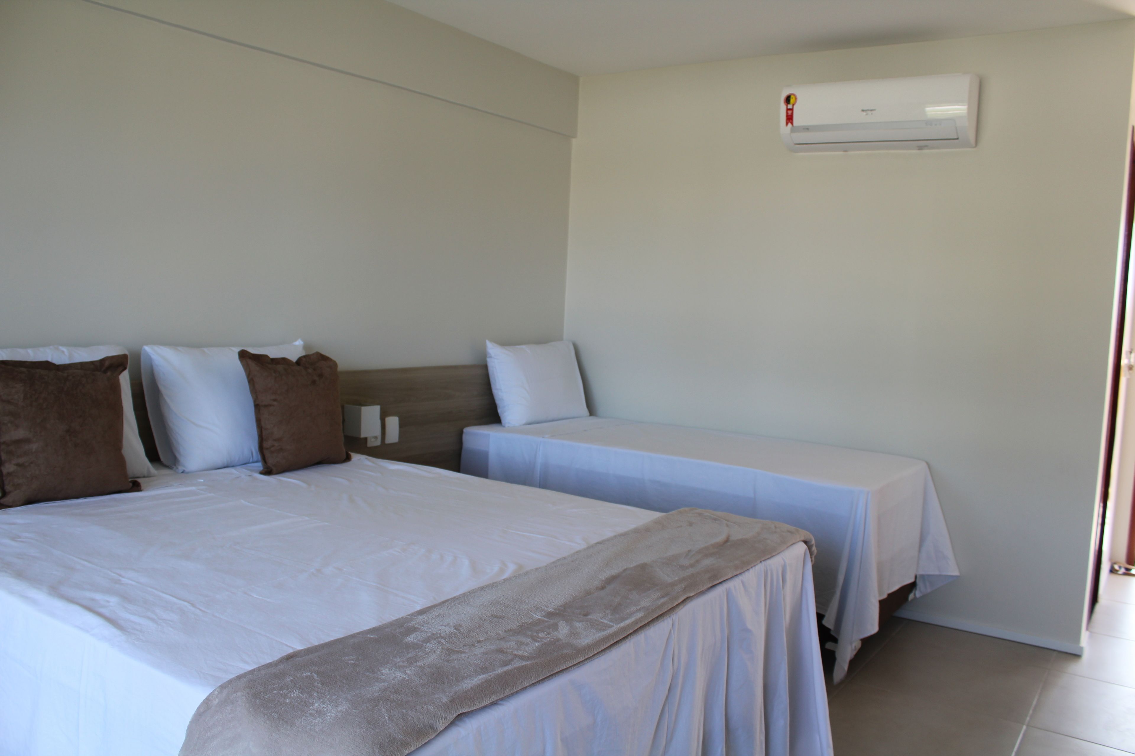 traditional triple room, multiple beds, non smoking, garden view | blackout curtains, free wifi, bed sheets