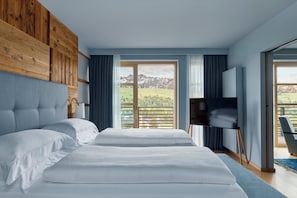 Deluxe Suite | Peralatan tempat tidur premium, gebar bulu kapas, bar mini