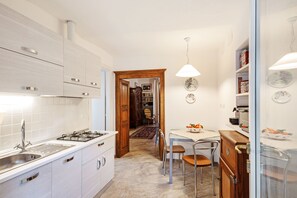 Apartment, 1 Bedroom, Patio | Private kitchen | Full-size fridge, stovetop, cookware/dishes/utensils