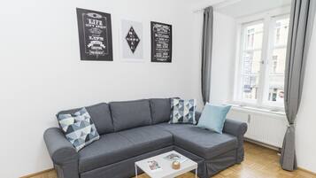 Design Apartment, 1 Bedroom, City View (incl. 60€ cleaning fee) | Living area | Flat-screen TV