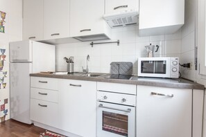 Appartamento, 1 camera da letto | Cucina privata | Frigorifero con congelatore, microonde, piano cottura, lavastoviglie