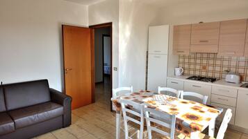 Apartment, 2 Bedrooms, Non Smoking | Living area | Flat-screen TV