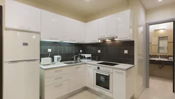 Apartment | Private kitchen | Full-size fridge, microwave, stovetop, espresso maker