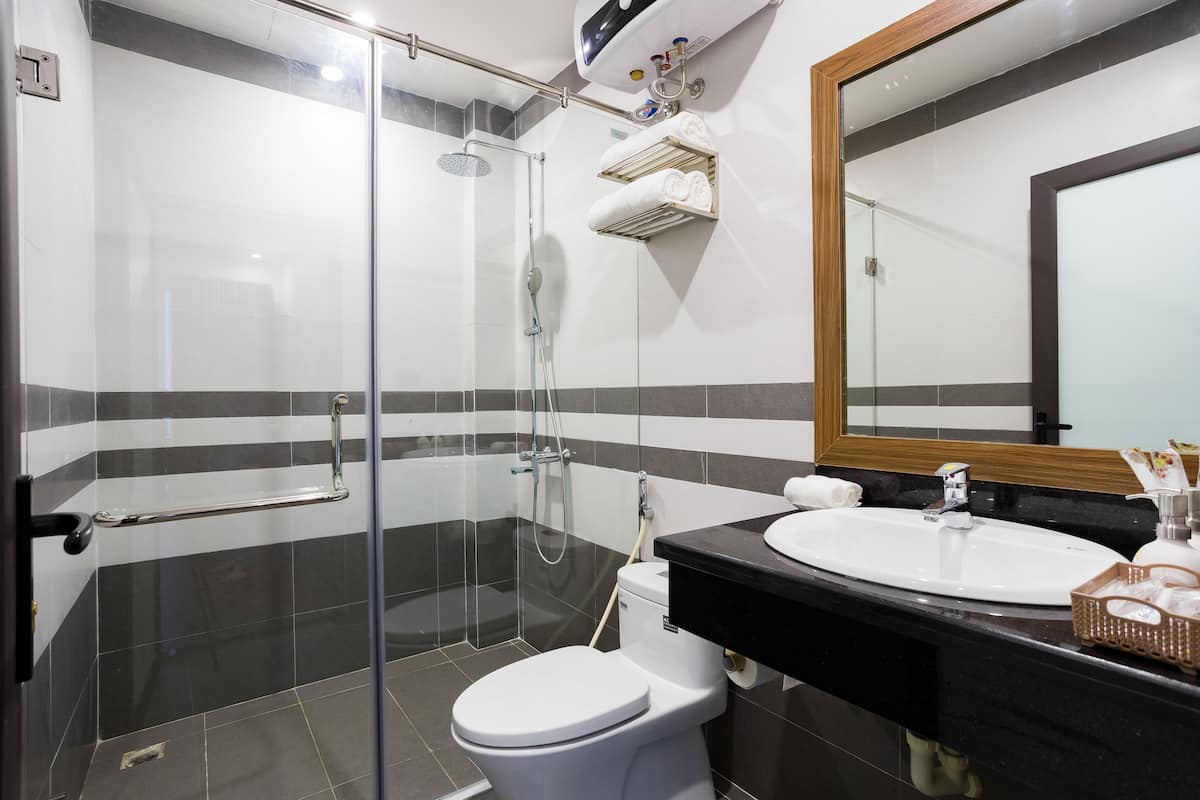 Shower, free toiletries, hair dryer, slippers