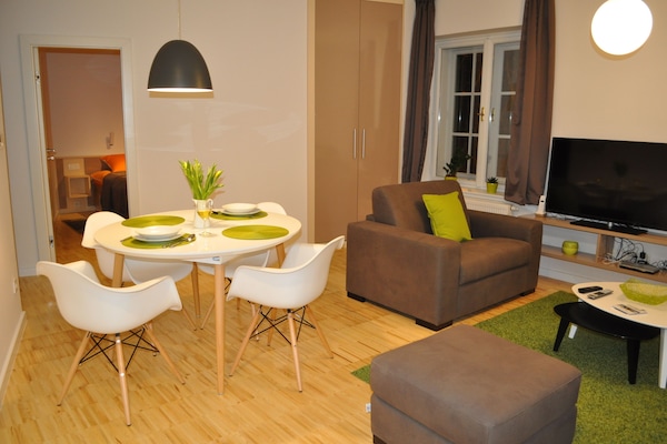 Exclusive Apartment, City View (Green) | Living area | 40-inch flat-screen TV with cable channels, LCD TV