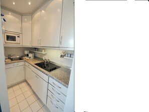 Køleskab, mikrobølgeovn, opvaskemaskine, brødrister