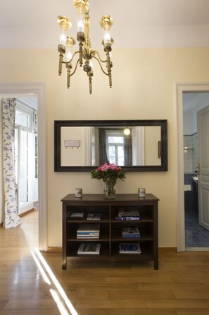 Apartment, 2 Bedrooms, Patio | Living area | Flat-screen TV, fireplace