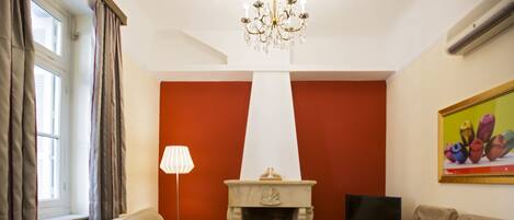Apartment, 2 Bedrooms, Patio | Living area | Flat-screen TV, fireplace