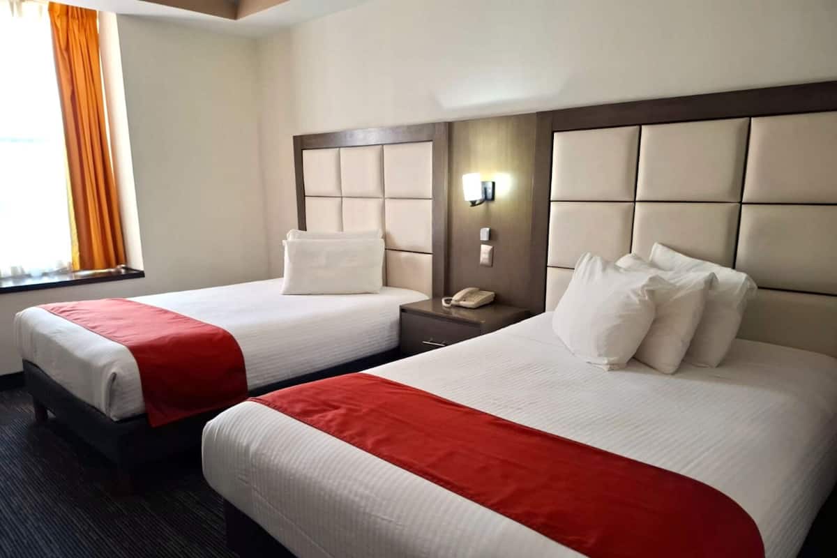 Caja de seguridad en la habitación y cortinas blackout