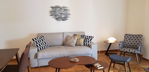 Apartment, 2 Bedrooms | Living area | Flat-screen TV, DVD player