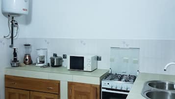 Rumah Standar, 2 kamar tidur | Dapur pribadi | Lemari es, oven, kompor, dan mesin pembuat kopi/teh