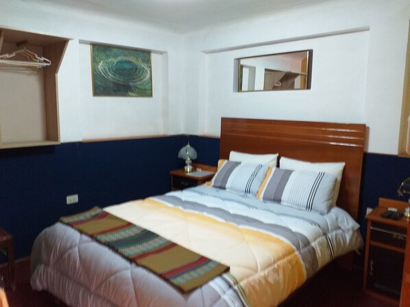Desk, blackout curtains, free WiFi, bed sheets