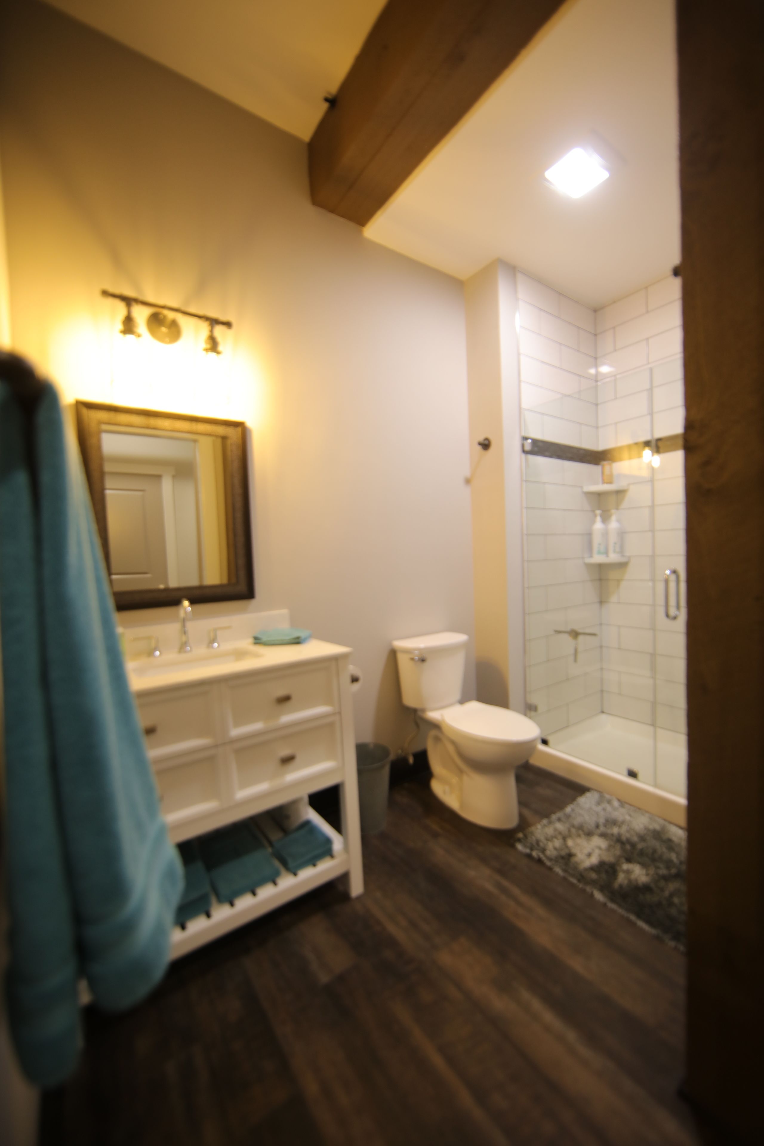 signature studio suite, 1 king bed, non smoking, city view | bathroom | shower, hair dryer, towels