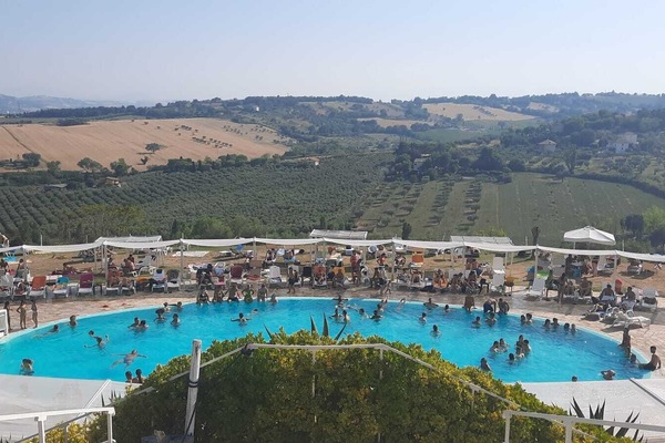 Seasonal outdoor pool, open 8:00 AM to 7:00 PM, sun loungers