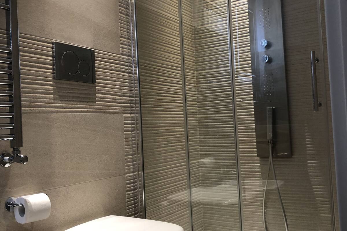 superior room, 1 king bed, patio | bathroom | free toiletries, hair dryer, bathrobes, bidet