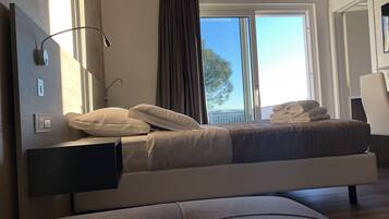 Family Triple Room, 1 Queen Bed, Balcony, Pool View | 1 bedroom, hypo-allergenic bedding, minibar, in-room safe