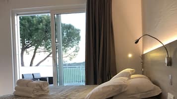 Family Triple Room, 1 Queen Bed, Balcony, Pool View | 1 bedroom, hypo-allergenic bedding, minibar, in-room safe