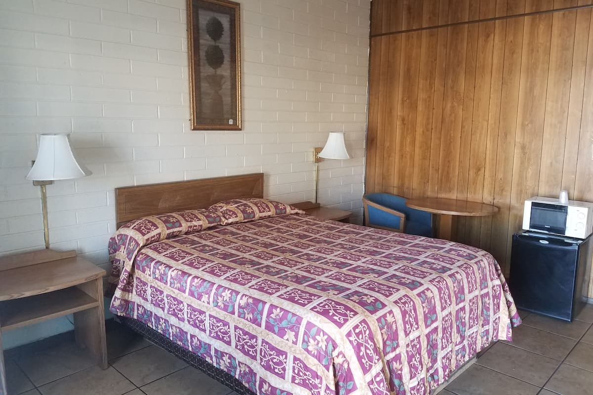 Desk, blackout curtains, soundproofing, bed sheets