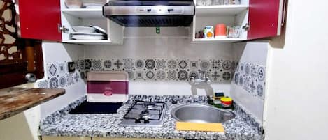 Fridge, coffee/tea maker, electric kettle, toaster