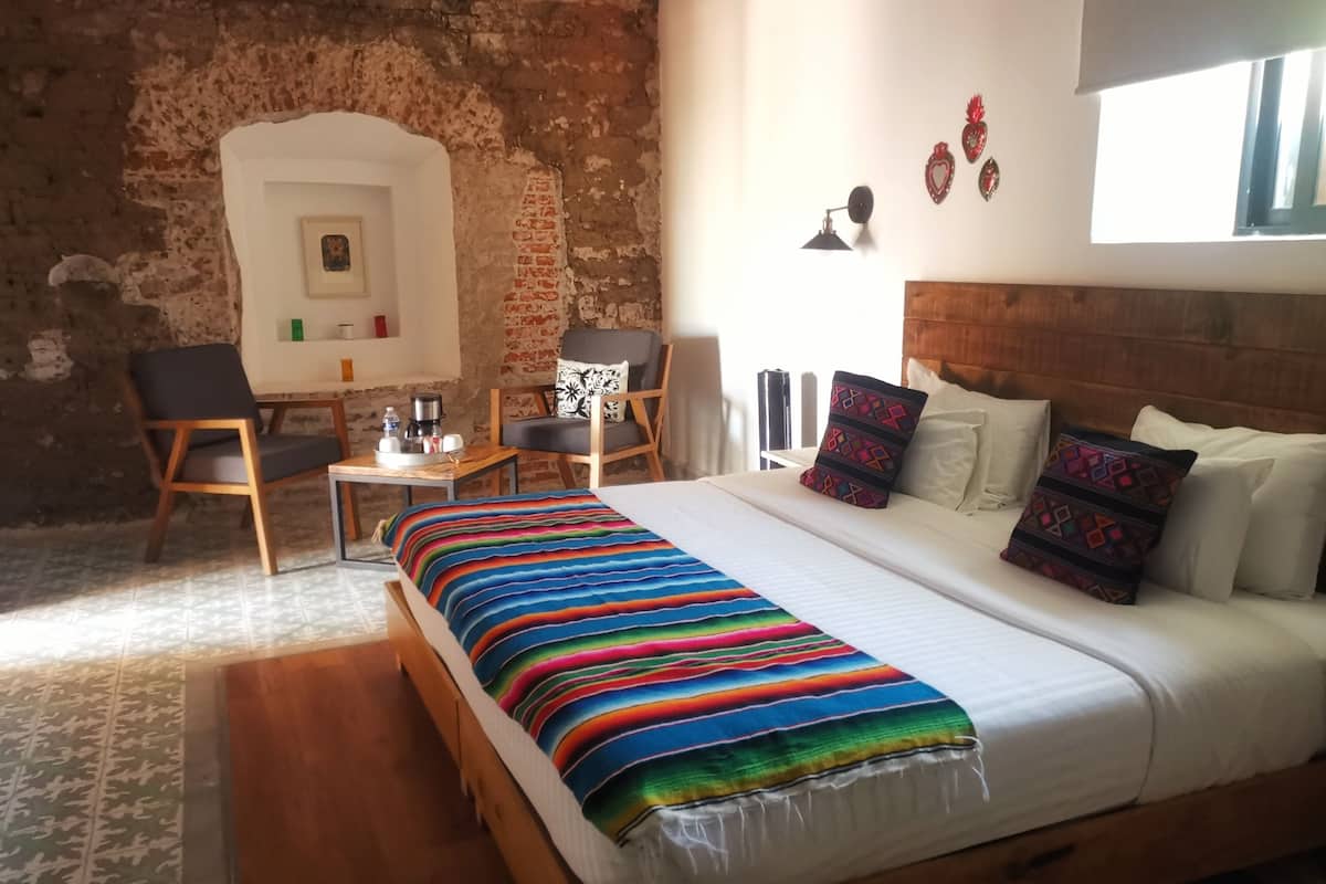 Suite Deluxe, 1 cama King size | 1 habitación, ropa de cama de alta calidad y edredón