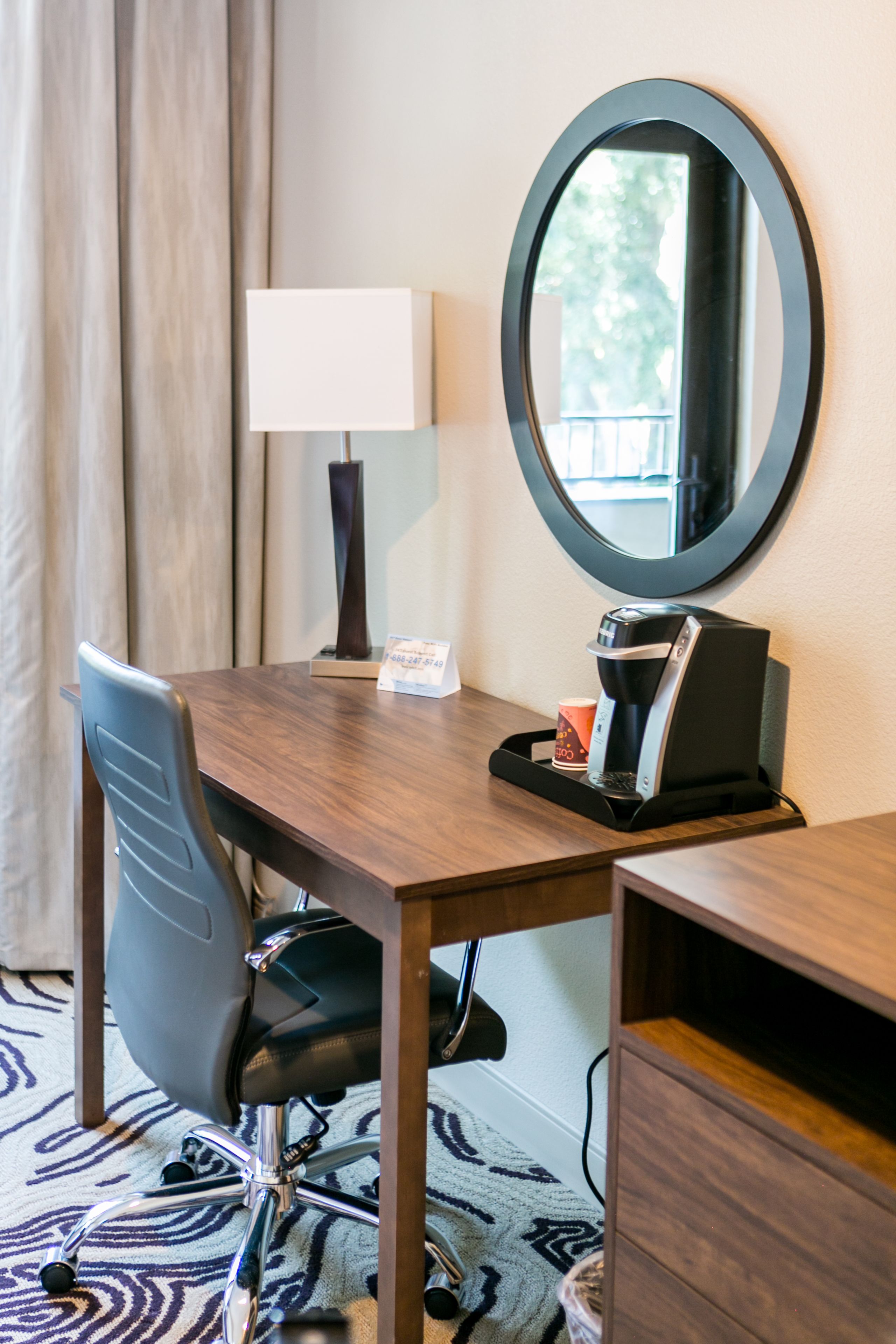 desk, blackout curtains, soundproofing, iron/ironing board