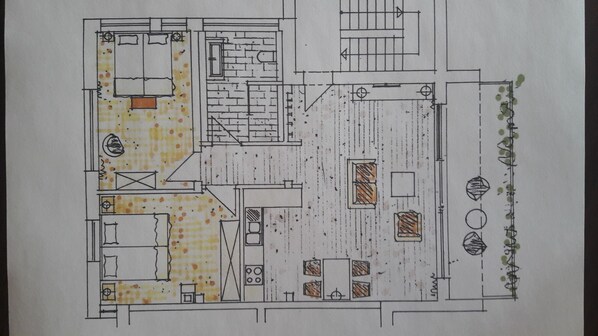 Guests can enjoy a spacious communal area with a staircase leading to rooms, each with large windows and a kitchen area.