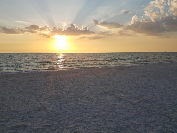 On the beach, sun-loungers, beach towels