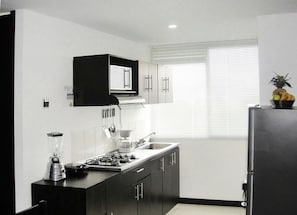 Family Apartment, Multiple Beds, Private Bathroom, Mountain View | Private kitchen | Fridge, microwave, stovetop, coffee/tea maker - Apartahotel Jeronimos (Montenegro)