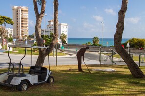 Enjoy ocean views and easy access to a nearby golf course.