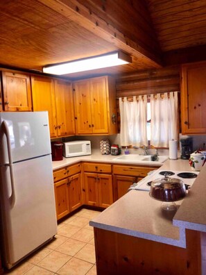 Microwave, toaster, cookware/dishes/utensils