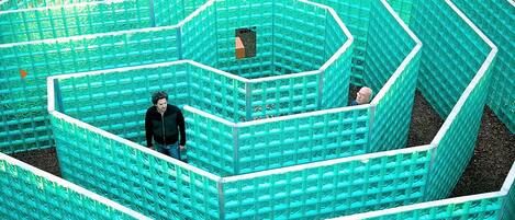 A maze structure made of interlocking plastic blocks.