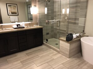 Bathtub, jetted bath, hair dryer, towels