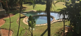 Palm Villa Room1 Exclusive en-suite room with private Patio on ground floor 