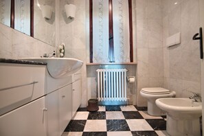 Shower, jetted bath, hair dryer, bidet