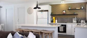 Trifecta House - Mari, alberi e campi da golf.